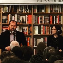 Alexander Chee and Maud Newton at The Queen of the Night launch at McNally Jackson in New York City, in front of a wall of books